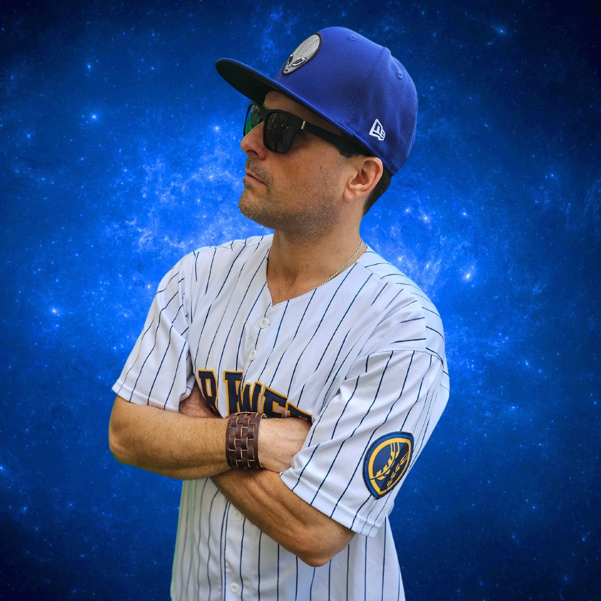 Cosmicus in Milwaukee Brewers jersey looking up to the cosmos and alien UFOs